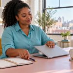 Personal Goals and Realistic Capacity: Make Room for Rest A woman closes a silver laptop beside a weekly planner.